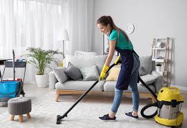 Professional home cleaning services for larger families cleaning a busy living room